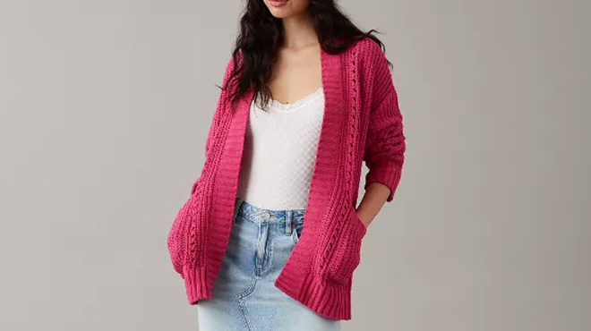A Person Wearing a Rose AE Slouchy Chenille Cardigan