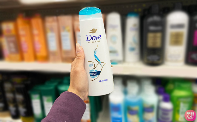 A Person is Holding Dove Beauty Daily Moisture Shampoo