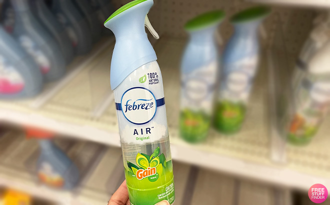A Person is Holding Febreze Gain Spray