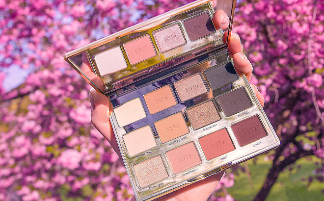 A Person is Holding Tarte Tartelette In Bloom Clay Palette