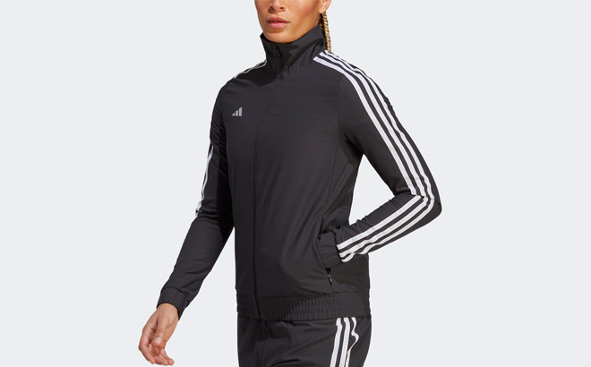 A Person is Wearing Adidas Womens The Trackstand Cycling Jacket in Black Color A Person is Wearing Adidas Womens The Trackstand Cycling Jacket in Black Color