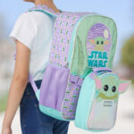 A Person is Wearing Star Wars Mandalorian Baby Yoda Laptop Backpack with Lunch Tote Bag in Purple Green Color