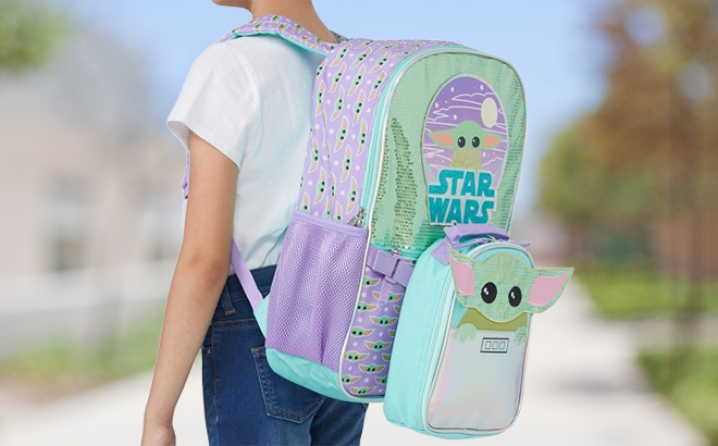 A Person is Wearing Star Wars Mandalorian Baby Yoda Laptop Backpack with Lunch Tote Bag in Purple Green Color