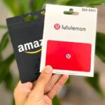 Amazon and Lululemon Gift Cards In Hand