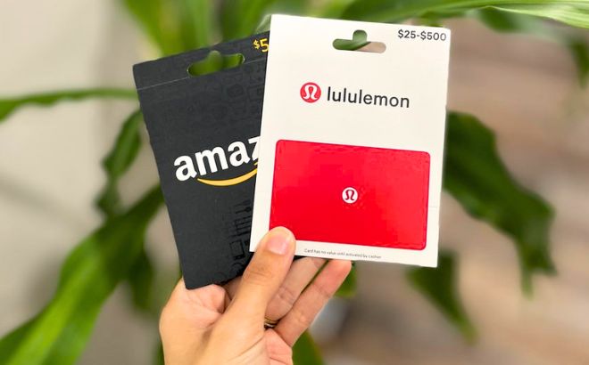 Amazon and Lululemon Gift Cards In Hand