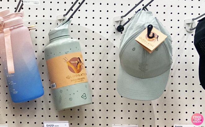 Blogilates Water Bottle and Cap on Store Shelf