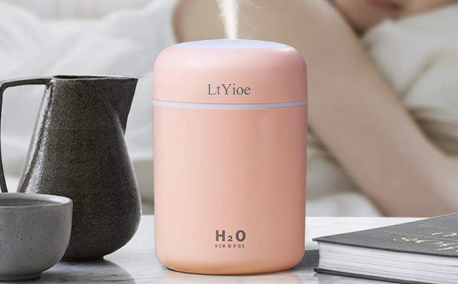 Cool Mist Mini Humidifier in Pink Color on a Table