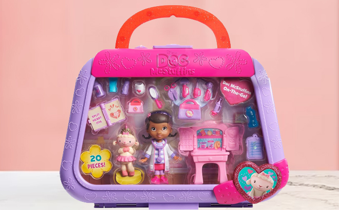 Doc McStuffins On the Go So Much Better Lambie 20 Piece Playset on the table