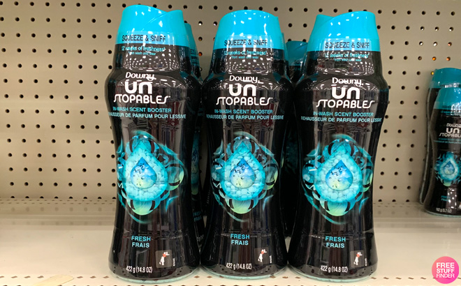 Downy Unstoppables In Wash Scent Booster Bottles on a Store Shelf