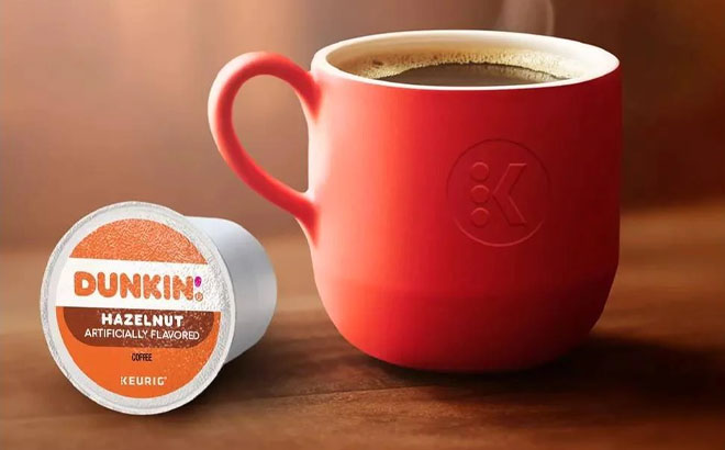 Dunkin Hazelnut Flavored Coffee Keurig K Cup Pods and a Cup of Coffee on a Table