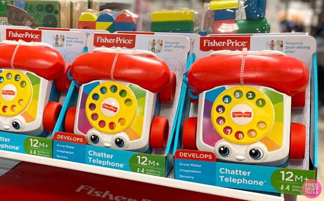 Fisher Price Chatter Telephone Pull Toys on a Shelf