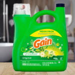 Gain Aroma Boost Liquid Laundry Detergent Original Scent 107 Loads on a Bathroom Counter