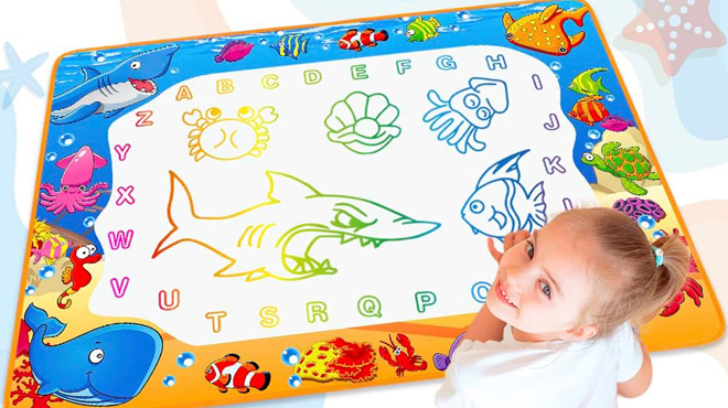 Girl Playing with Water Doodle Mat