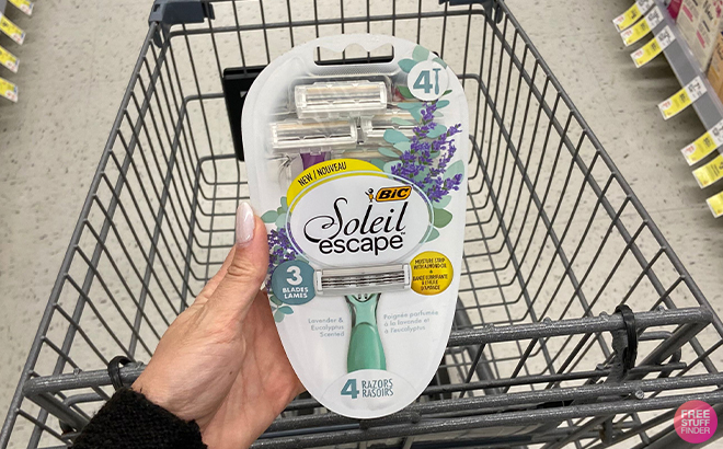 Hand Holding BIC Soleil Escape Womens Razors 4 Count at Walgreens