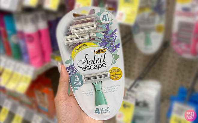 Hand Holding BIC Soleil Escape Womens Razors at Walgreens