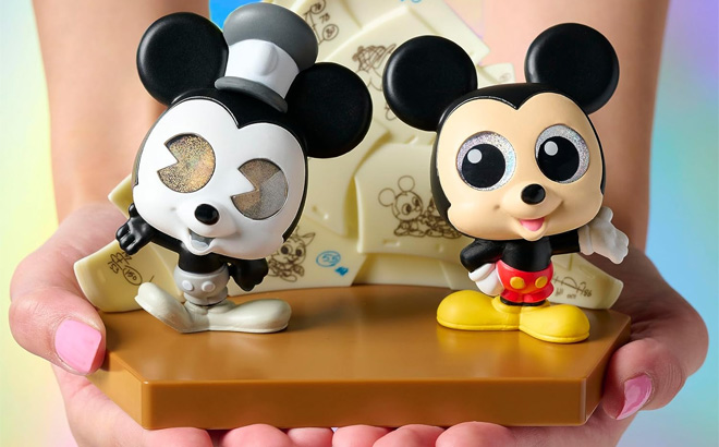 Hand Holding Disney Doorables Grand Mickey Mouse Set