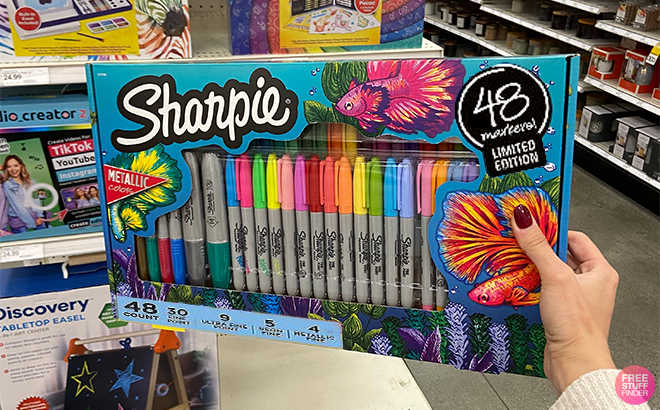 Hand Holding Sharpie Limited Edition Metallic 48 Count Fine Tip Permanent Markers