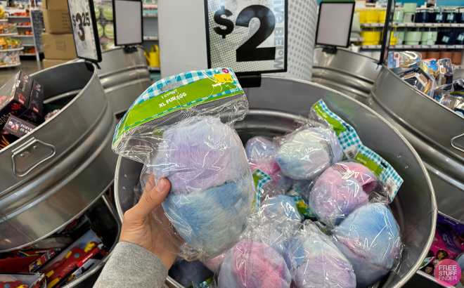 Hand Holding XL Fur Easter Egg at Five Below