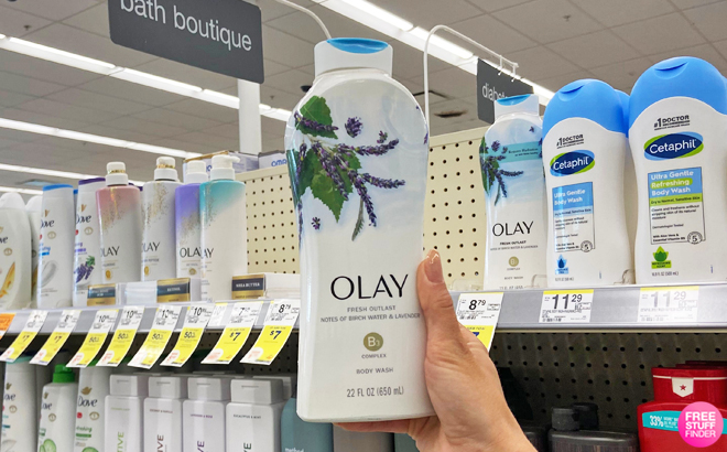 Hand Holding a Bottle of Olay Body Wash
