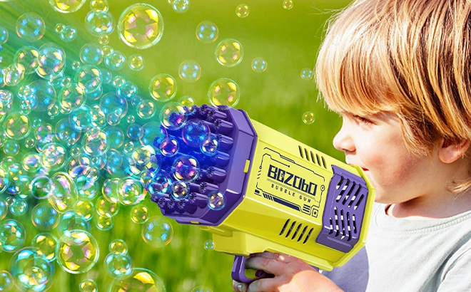 Kid is Holding Bubble Gun in Yellow Color