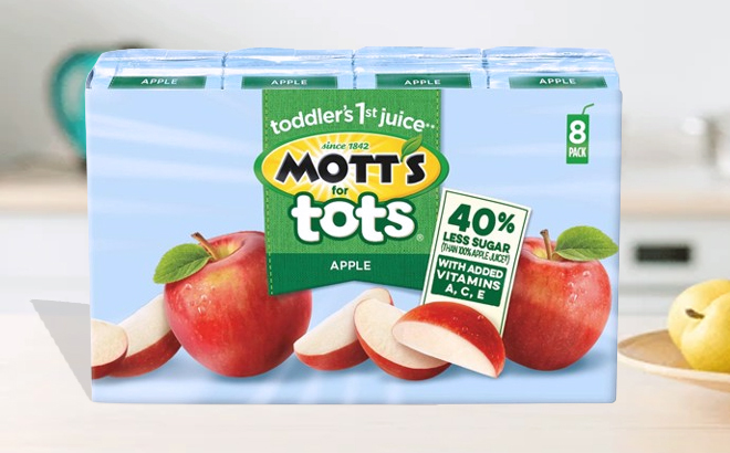 Motts For Tots Apple Juice Drink on the table