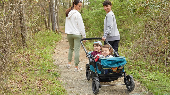 People Pulling Kids in a Graco Modes Adventure Wagon Stroller