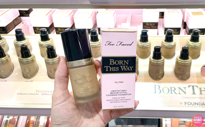 Person Holding Too Faced Born This Way Foundation at a Store