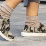 Person Wearing Hey Dude Womens Wendy Camo Slip One Shoes
