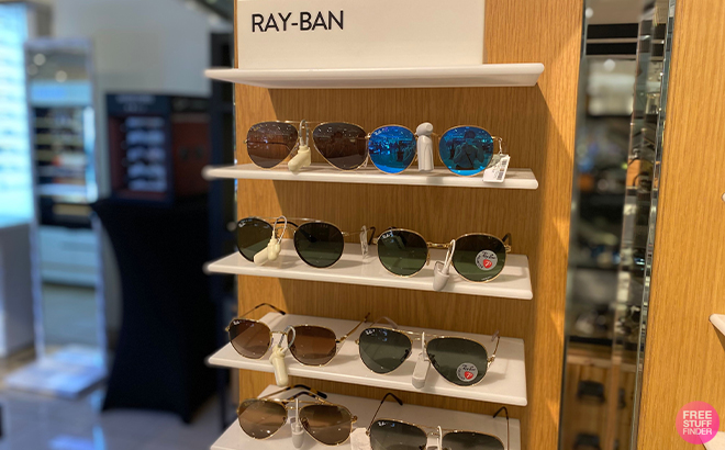 Ray Ban Sunglasses Displayed on Shelves at a Store