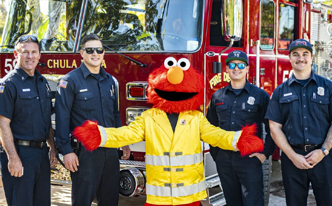 Sesame Place Elmo with Police Officers