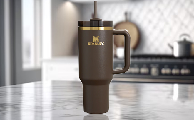 Stanley The Chocolate Gold Quencher H2 0 Flowstate Tumbler 40 Oz on a Kitchen Counter