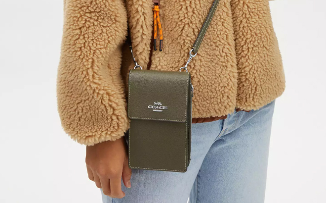 Woman Wearing Coach Outlet North South Phone Crossbody