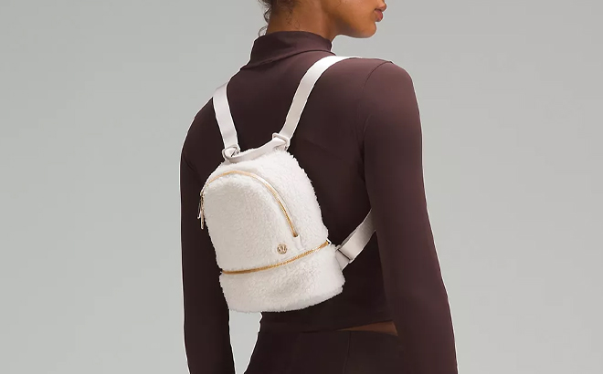 Woman Wearing Lululemon City Adventurer Micro Backpack