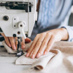 Woman Working on a Sewing Machine