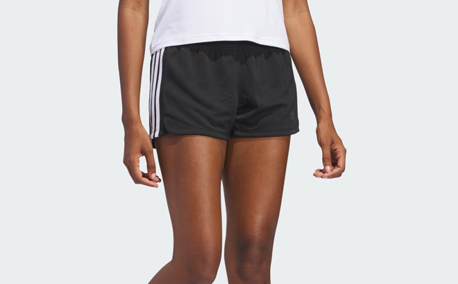 Woman is Wearing Adidas Pacer 3 Stripes Kint Womens Shorts