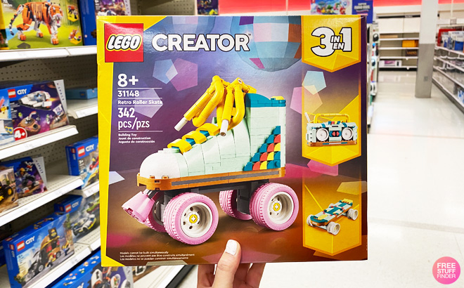 a Person Holding LEGO Creator Retro Roller Skate Building Set