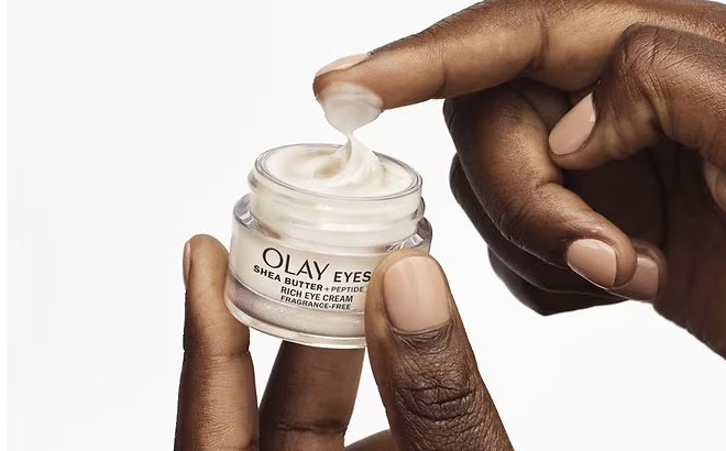 a Person Holding Olay Shea Butter Peptide Eye Cream