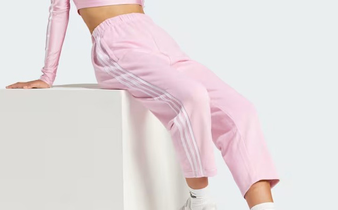 a Woman Wearing Pink Adidas Joggers