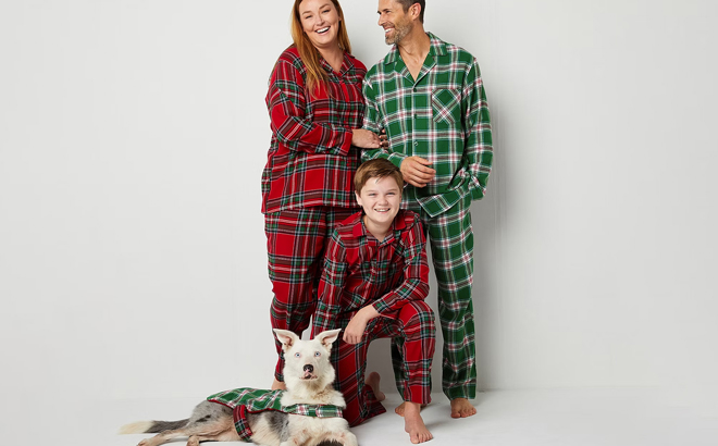 an Image of a Family Wearing a Mix Match Plaids Matching Family Pajamas