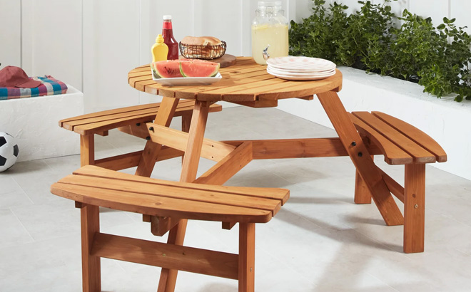 6 Person Circular Wooden Picnic Table in Natural Color in the Yard