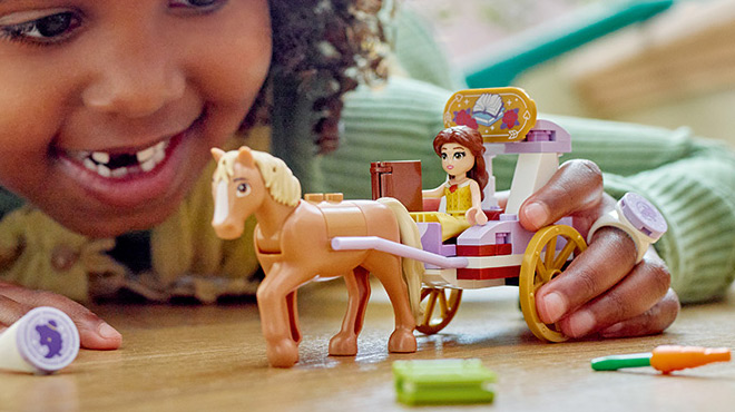 A Child Playing LEGO Disney Princess Belles Horse Carriage Mini Doll