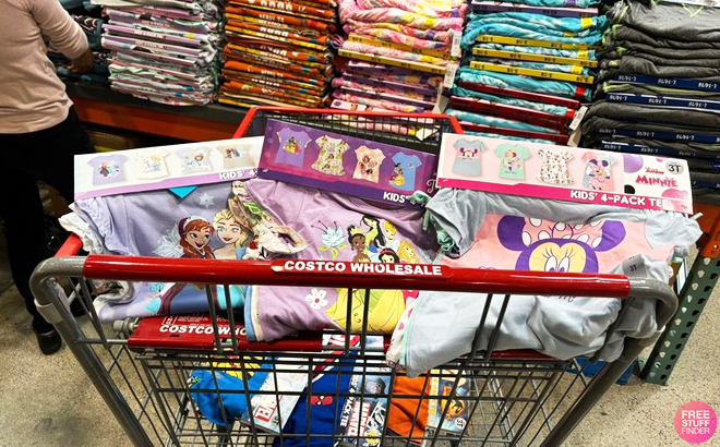 A Costco Shopping Cart Filled with Kids Character Tees