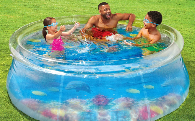 A Family Playing in the Unbrand 8 Foot Round Transparent Above Ground Pool