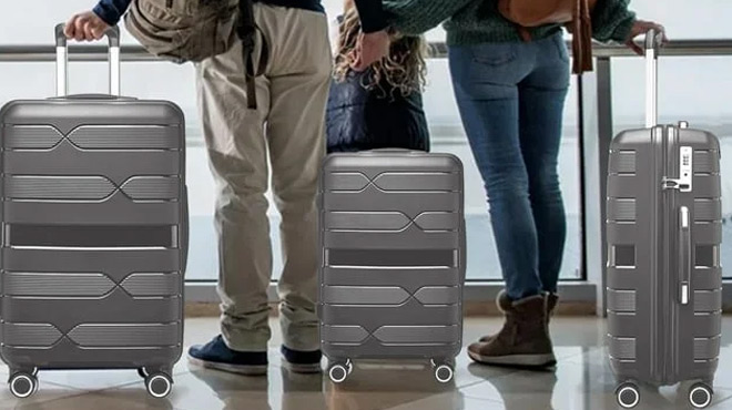 A Family Traveling Holding Petimi 3 Piece Luggage Sets