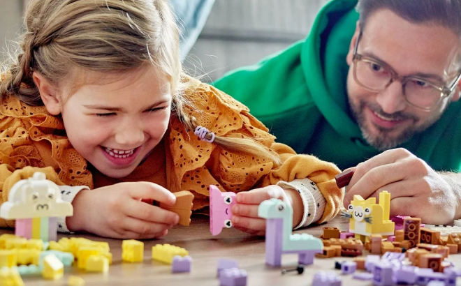 A Father and His Daughter Playing with LEGO Classic Creative Pastel Fun Bricks
