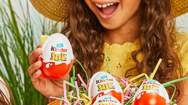 A Girl Holding Kinder Joy Egg