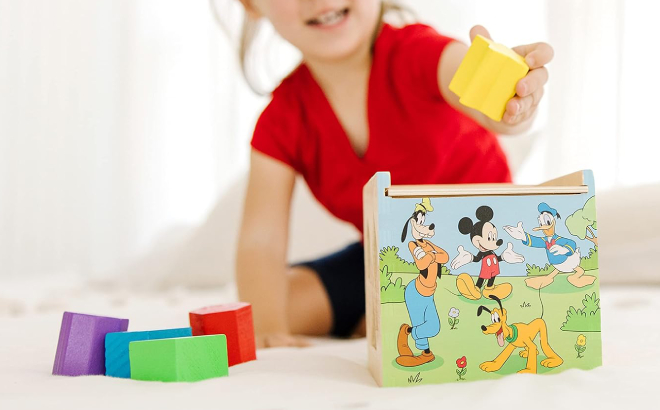A Girl Playing with Melissa Doug Disney Mickey Mouse Wooden Shape Sorting Cube
