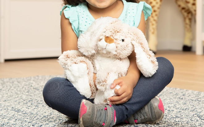 A Kid is Holding Melissa Doug Burrow Bunny Rabbit Stuffed Animal