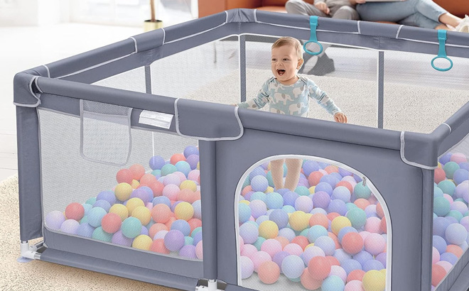 A Kid is Playing in Suposeu Baby Playpen