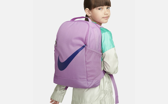 A Kid Wearing Nike Brasilia Kids Backpack